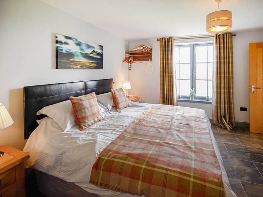 Relaxing double bedroom with dressing area | Storr - Brogaig Cottages, Brogaig, near Staffin