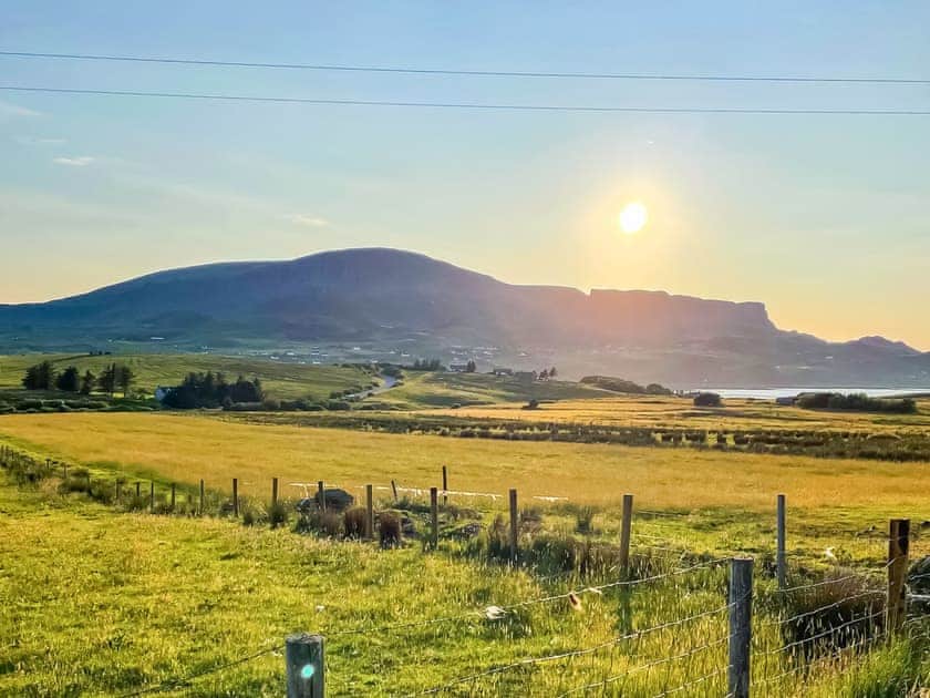 Staffin and The Quiraing in the background | Storr - Brogaig Cottages, Brogaig, near Staffin