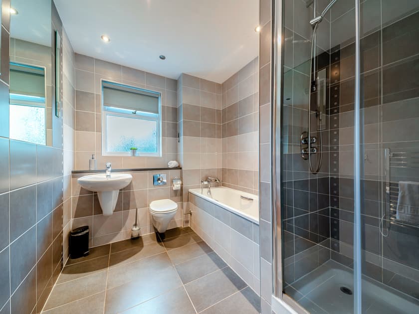 Bathroom with shower over bath and heated towel rail | 8 Military Drive - Military Drive, Portpatrick, near Stranraer