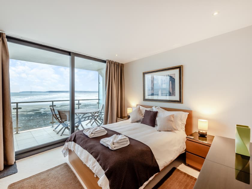 Welcoming double bedroom with fantastic sea views | Apartment 50, Westward Ho!