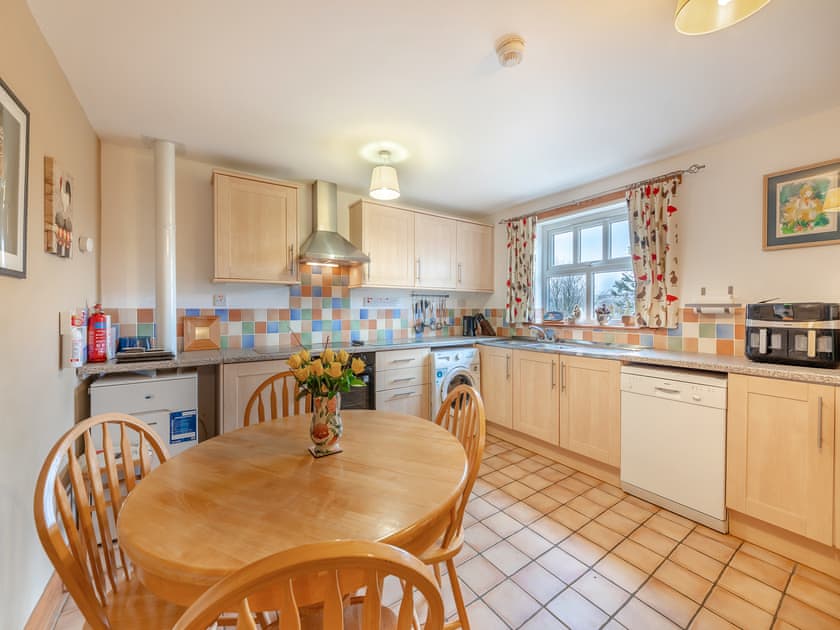 Large, well-equipped kitchen and dining area | Nelly’s Cottage - Low Cornriggs Farm, Cowshill, near Alston