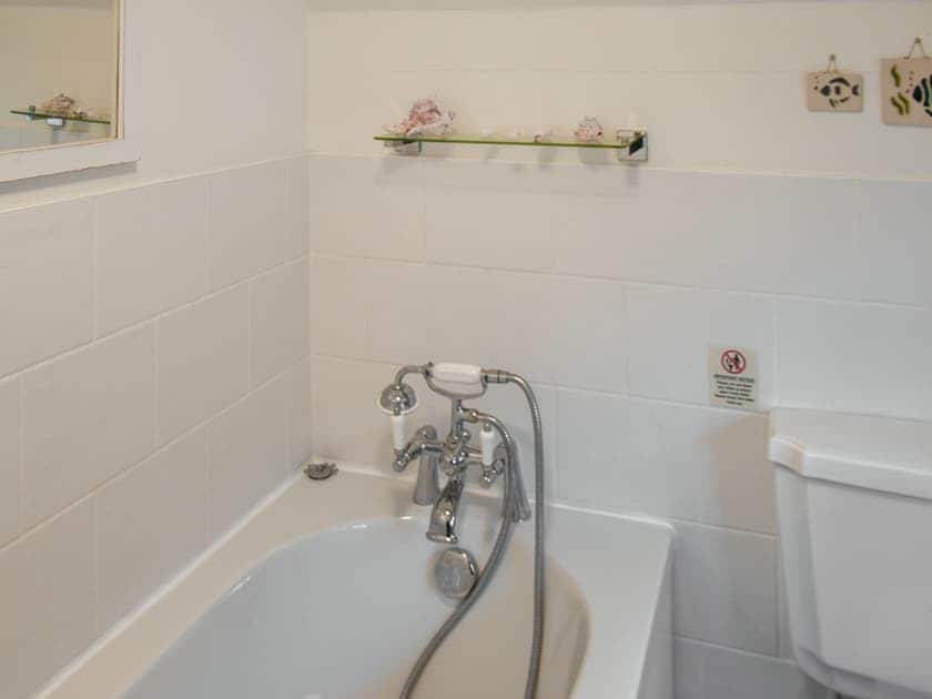 Small, sit-in bath tub | White Stones Cottage, Caister-on-Sea, near Great Yarmouth