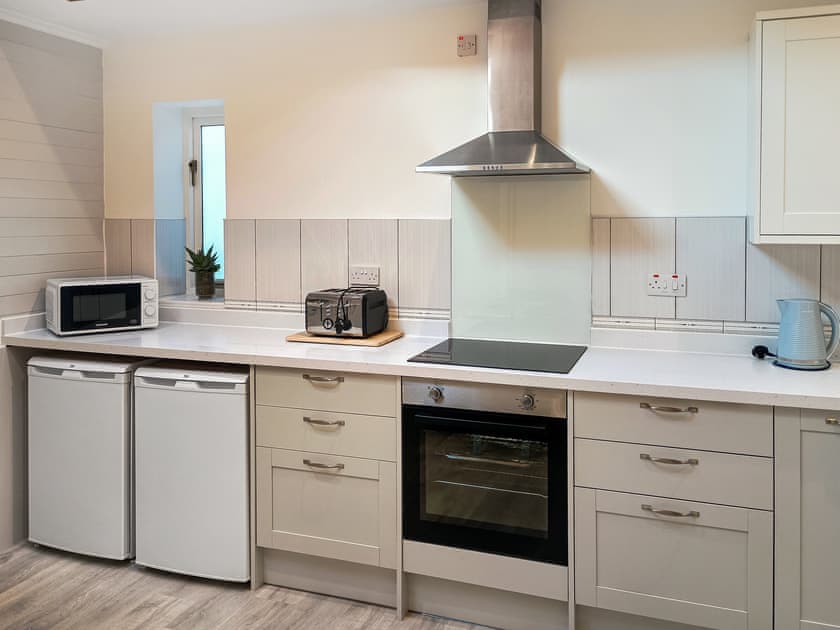 Fridge, freezer, electric fan oven and induction hob | The Wheelhouse, Whitby
