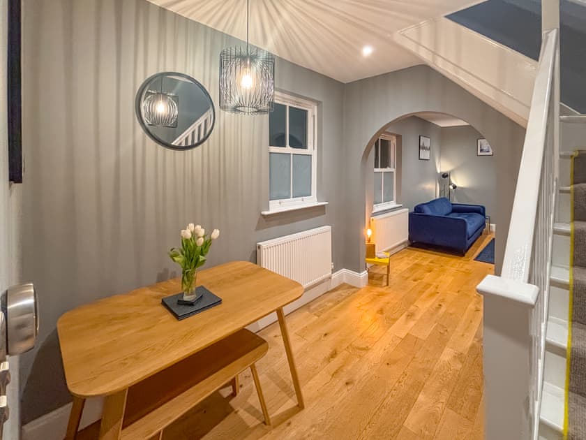 Cosy living room through to the dining area | Ebor Cottage, York
