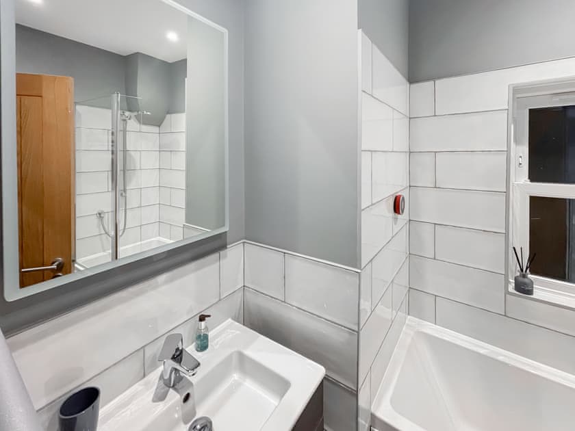 Illuminated mirror above the washbasin | Ebor Cottage, York