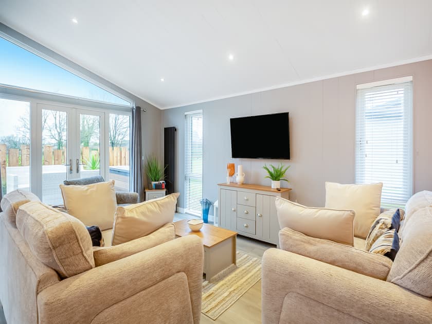 Open plan living space | Four Sandbanks, Benllech