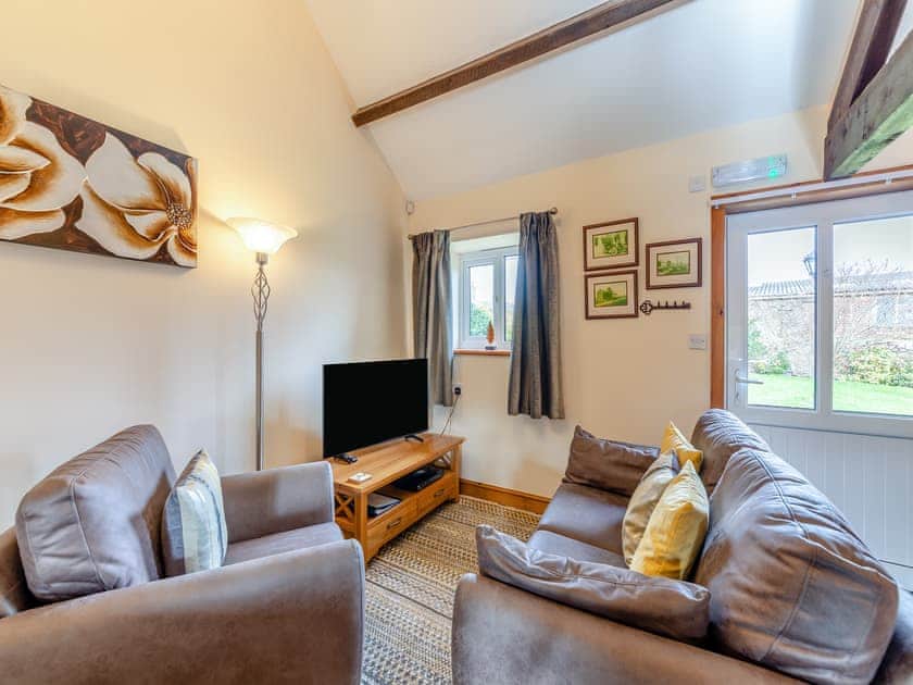 Open plan living space | Eight Byre - Dickinson Place Holiday Cottages, Allonby