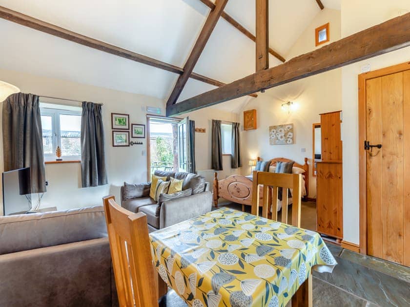 Open plan living space | Eight Byre - Dickinson Place Holiday Cottages, Allonby