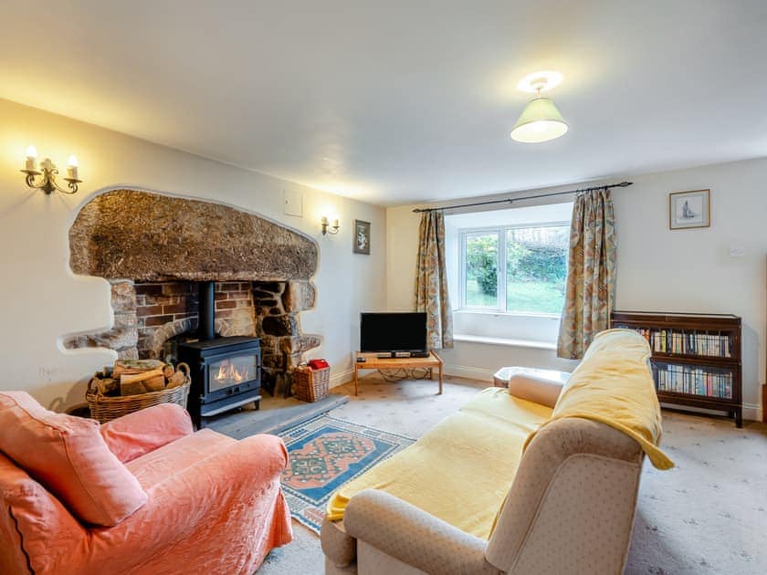 Cosy living room with wood burner | Lukesland Farm Cottage, Harford, Dartmoor National Park