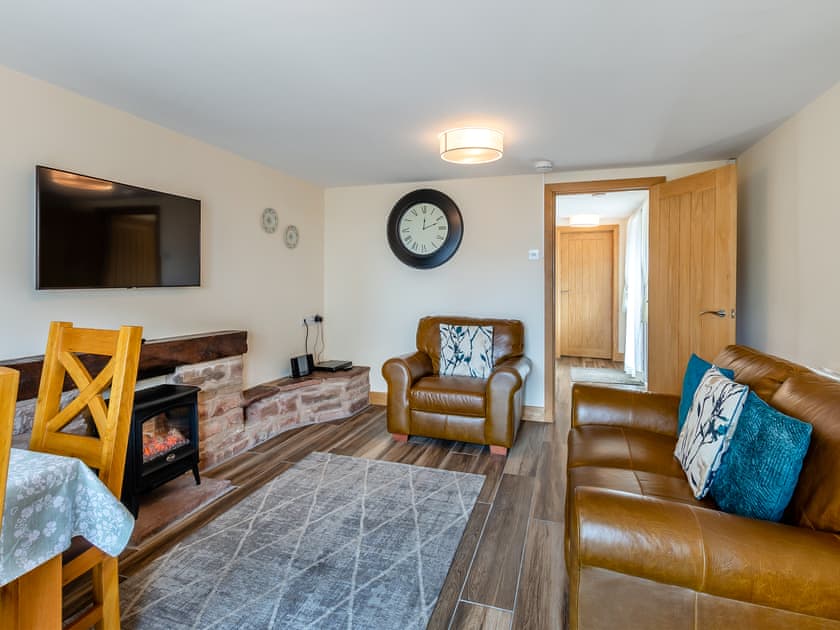 Living area | Turnip House - Dickinson Place Holiday Cottages, Allonby