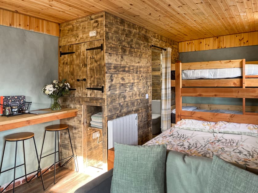 Open plan living space | Honeysuckle Bale Cabin - Straw Bale Cabins, Dallas