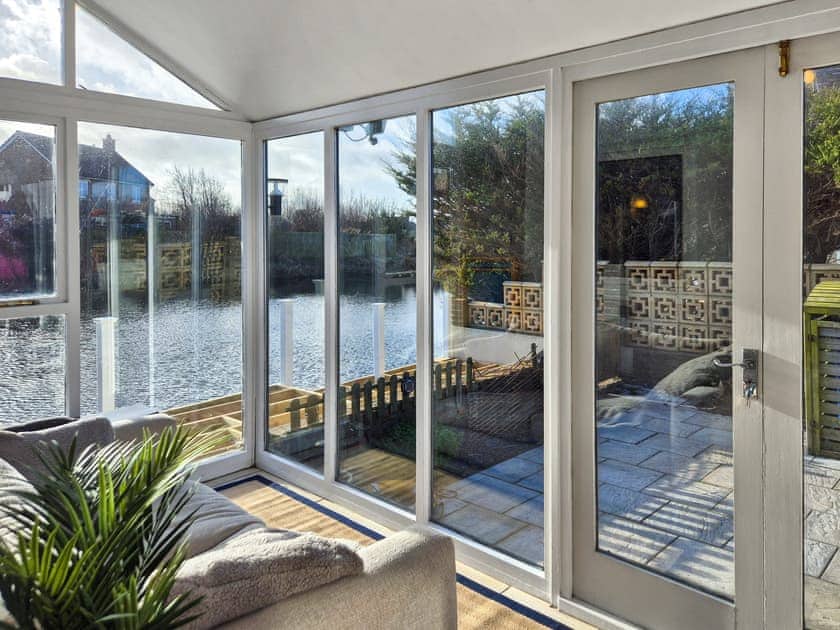 Conservatory | Water’s Edge Holiday Home, Beadnell