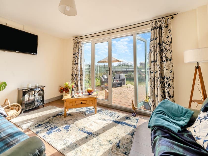 Living room | The Dairy - Norfolk Coastal Cottages, Heacham, near Hunstanton