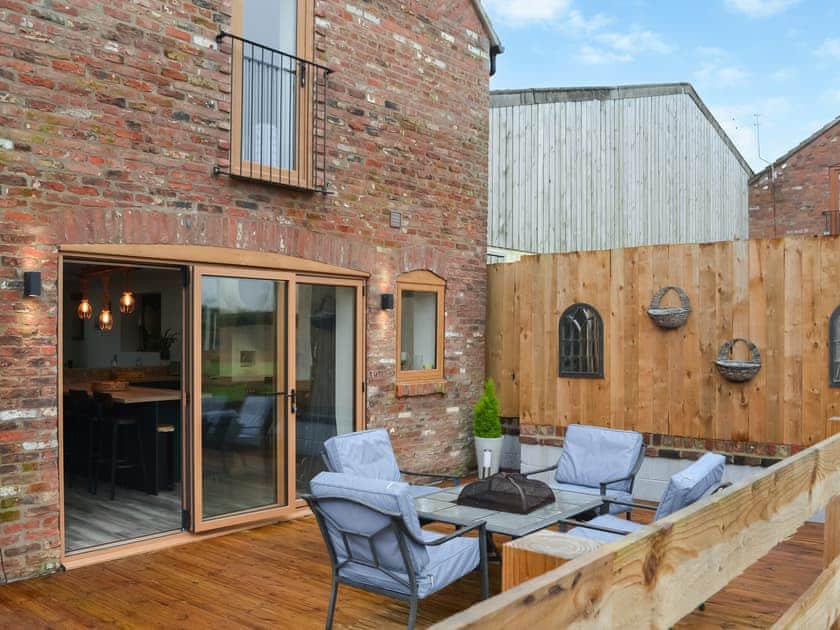 Sitting-out-area | Cart House - Clapham Holme Farm Cottages, Great Hatfield, near Hull