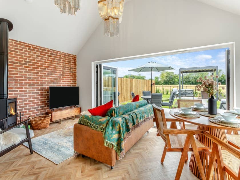 Open plan living space | Piglet Cottage - Wiggles and Piggles, Wimbish