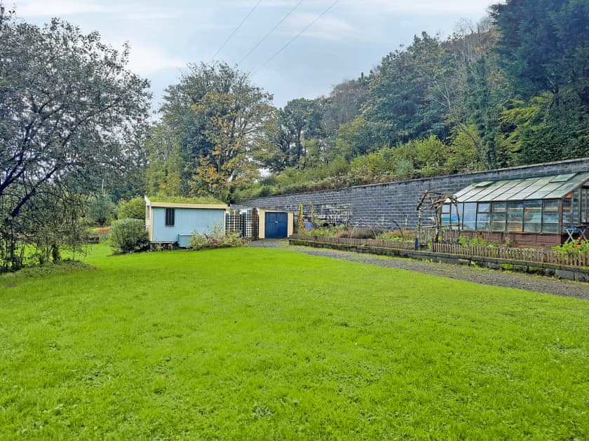 Grass area back of Rosie the Shepherd Hut | Rosie - Tanyrallt Holidays Lets, Llanybydder, near Lampeter