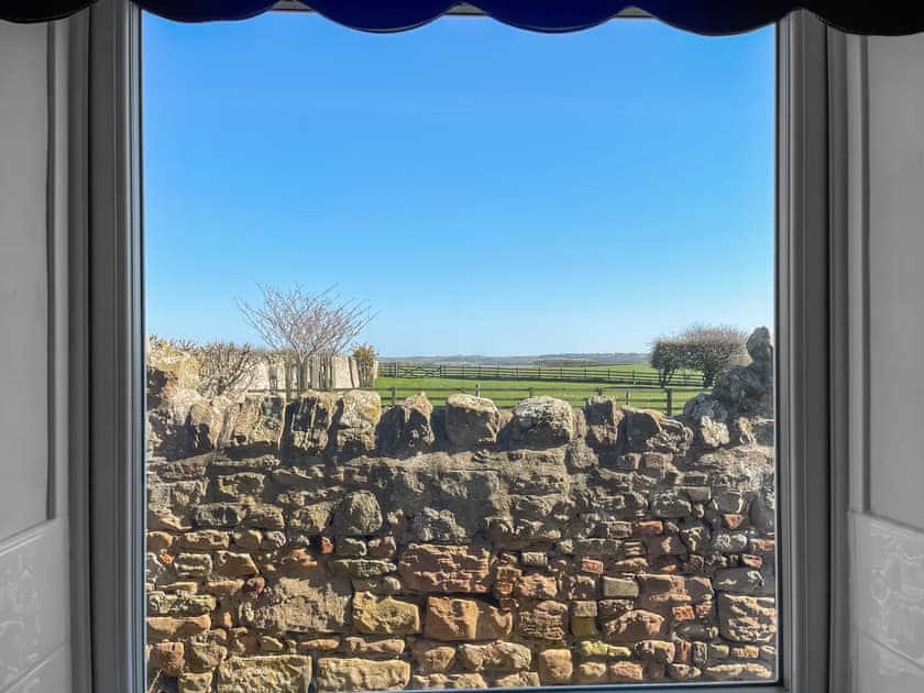 View to Budle Bay from the kitchen window   | Shepherd’s Cottage - Elwick Farm Holiday Cottages, Belford