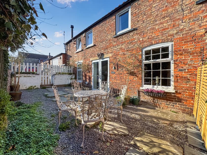 Mews courtyard garden | Warrington Mews - Warrington Retreat, Thornton-le-Dale, near Pickering