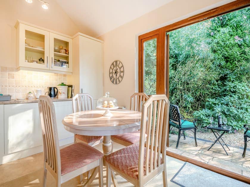 Well equipped, charming, kitchen dining area | Moorland Lodge, Holt Wood, near Wimborne