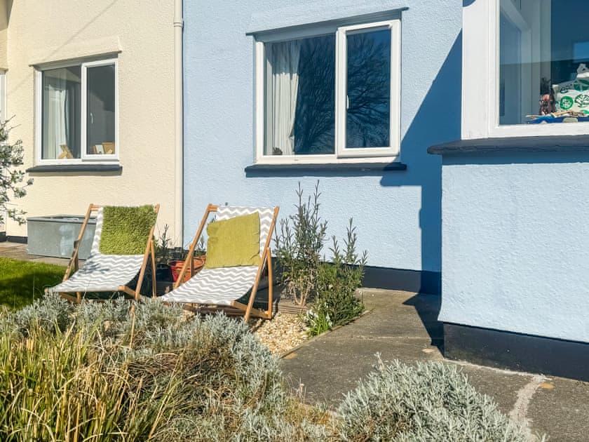 Deck chairs await .. in the front garden  | Malborough Park, Malborough