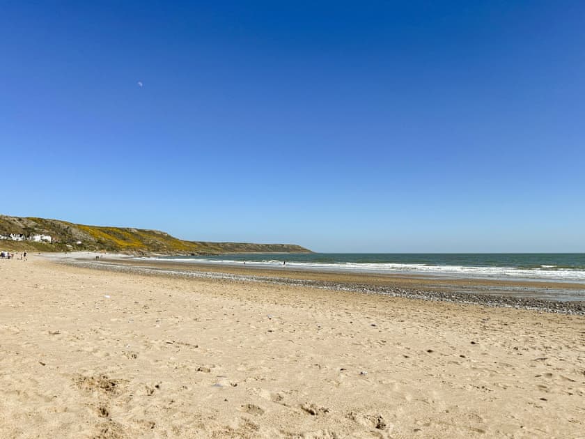 Port Eynon Beach five minutes walk from the Bungalow Highfields | Bungalow Highfields, Port Eynon