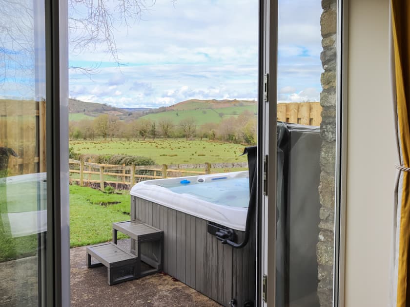 Hot tub | Towy Cottage - Ffynnongrech Farm Cottages, Talley, near Llandeilo