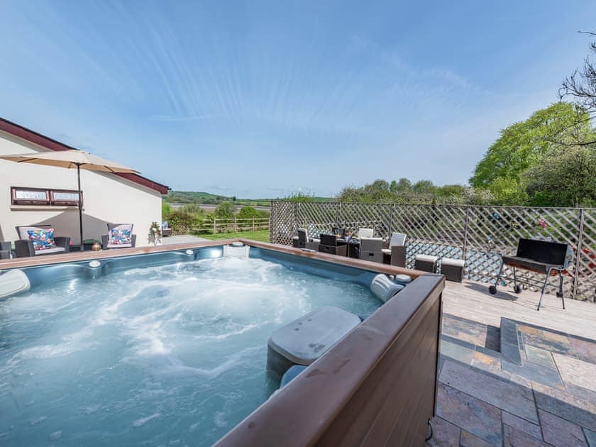 Hot tub | Wheelwright Barn - Bronyn Farm, Ferryside, near Carmarthen