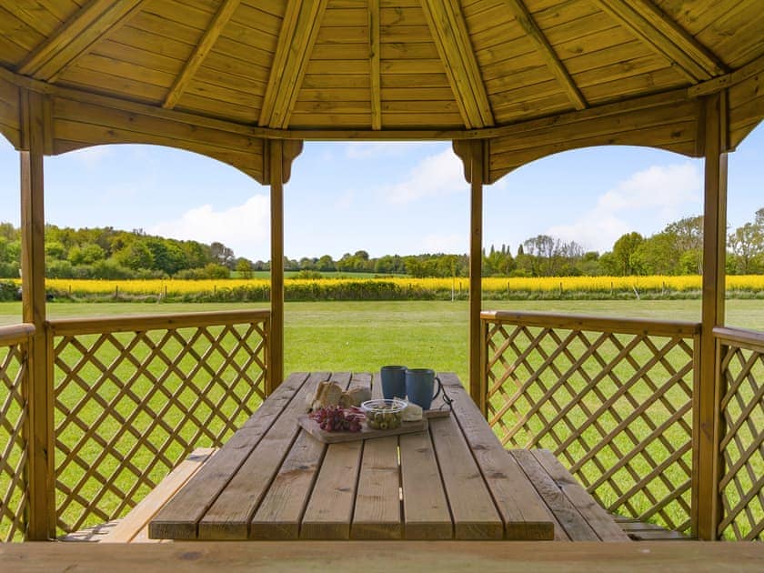 Outside seating in dog paddock  | Cedar - Chestnut Tree Barns, Ilketshall St Margaret near Bungay