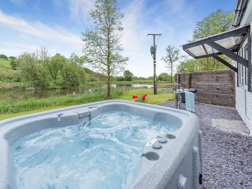 Hot tub | The Lodge - Maesydderwen Holiday Cottages, Llandeilo