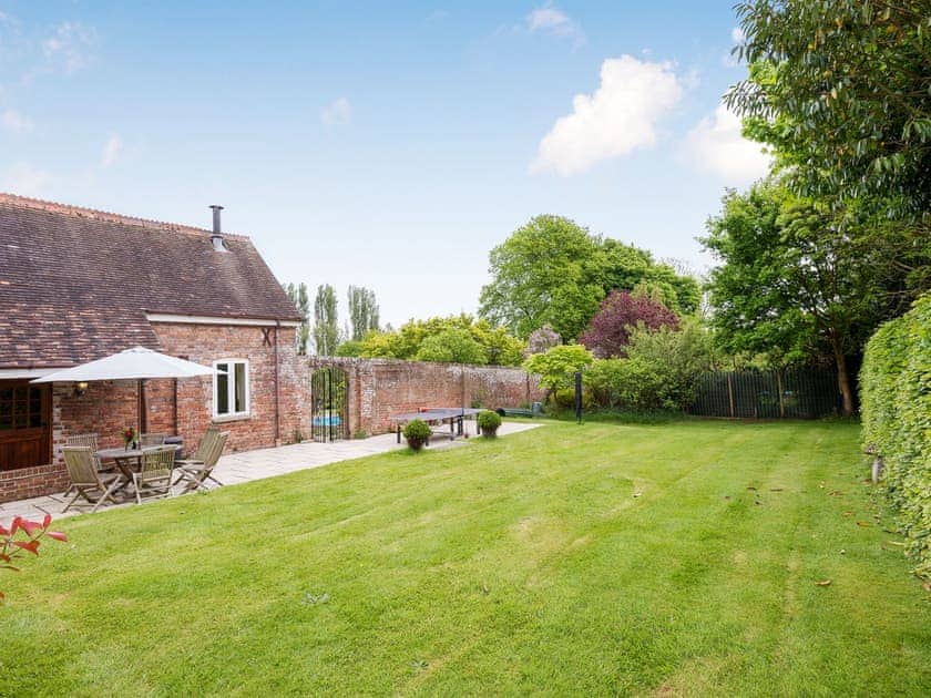 Exterior with large private garden | Coach House, Wareham