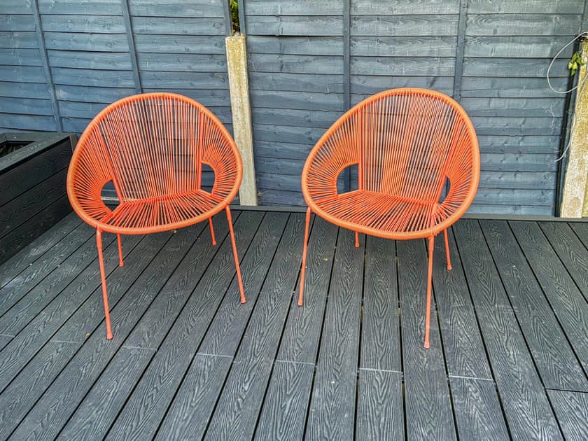 comfortable seating in the secluded back garden | Morecambe Home Stays, Lancaster