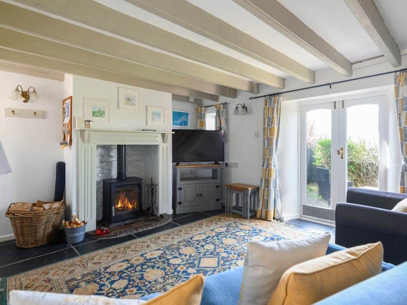 Charming living/ dining room with cosy wood burner | High View - Sandy Barn Cottages, St Breward, Bodmin Moor
