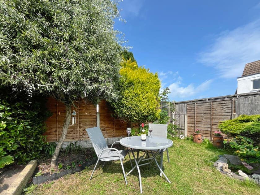 Sitting-out-area | Little Orme Cottage, Penhryn Bay, near Llandudno