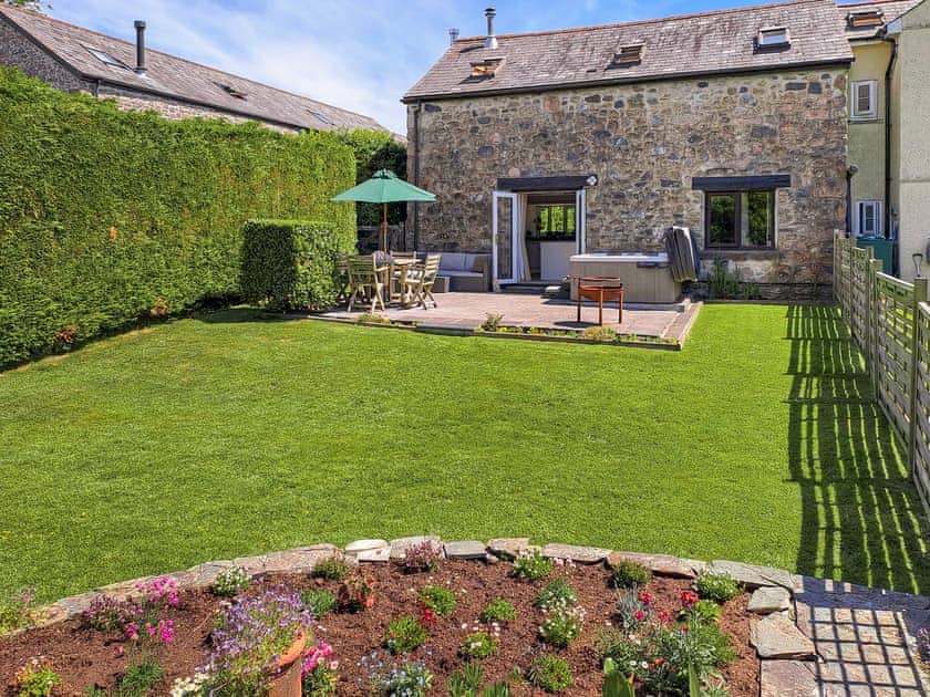 Garden and patio | Dunstone Cottage, Cadover Bridge
