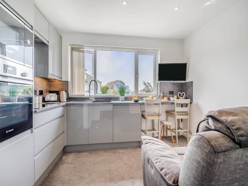 Open plan living space | Ocean Breeze - Bonnie View Beach Apartments, Holywell Bay