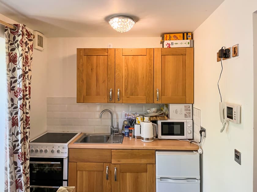 Kitchen | Fronisaf - Llanfairtalhaiarn Retreats, Llanfairtalhaiarn<br />