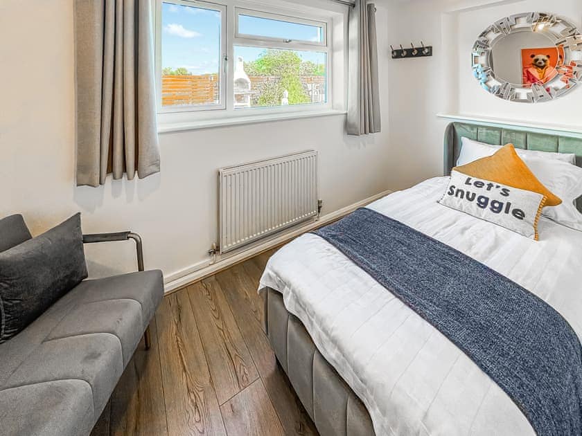 Single bedroom with armchair  | Minffordd, Ty Croes, near Rhosneigr