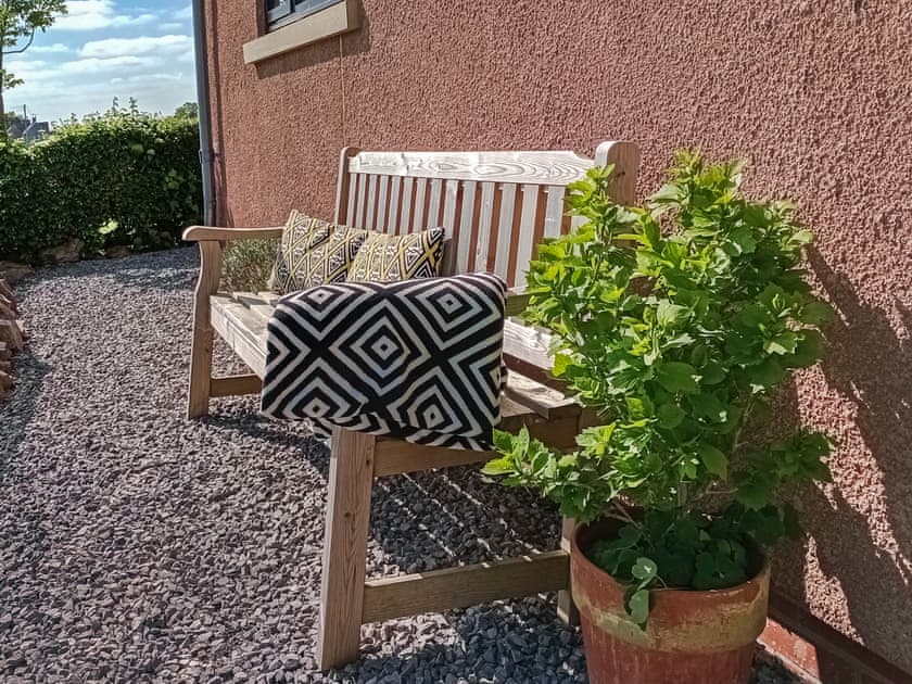 Bench at the rear of the Sett, with views of Cheddar gorge | The Sett, Stone Allerton, near Cheddar