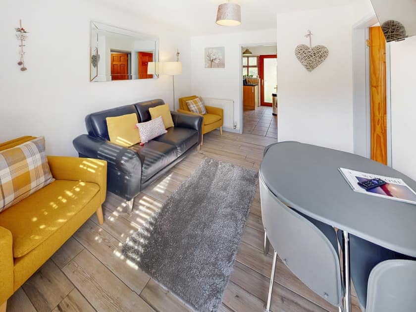Living room/dining room | Elm Cottage - Graiglwyd Springs Holiday Cottages, Penmaenmawr, near Conwy