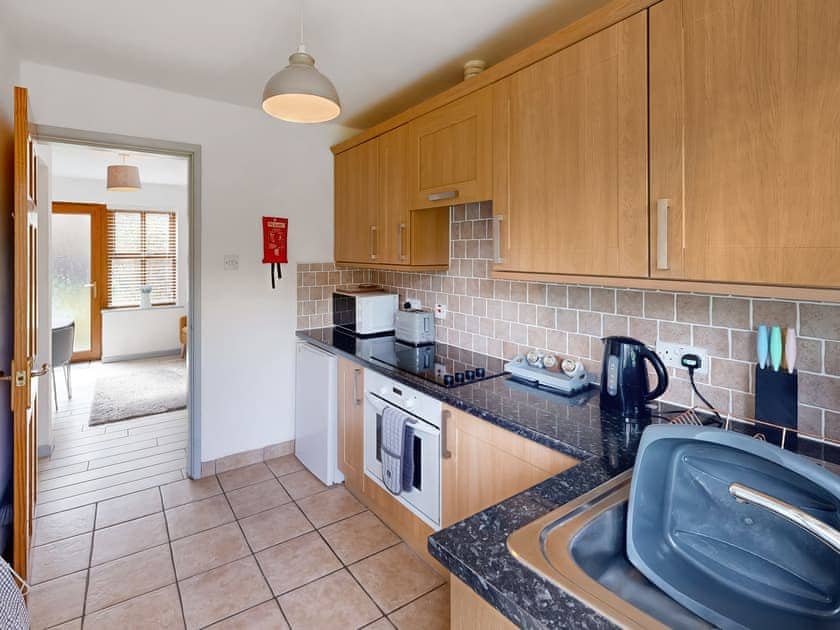 Kitchen | Elm Cottage - Graiglwyd Springs Holiday Cottages, Penmaenmawr, near Conwy
