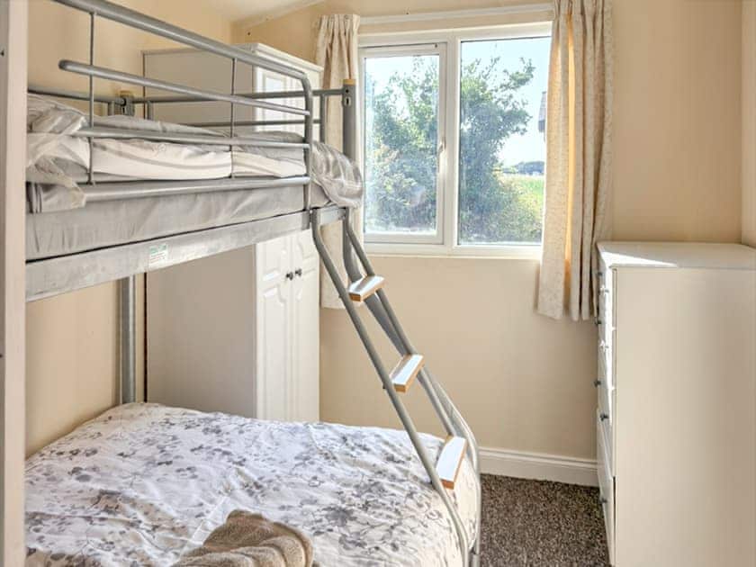 Double and single bunk bedroom | Seven Bays Retreat, Padstow