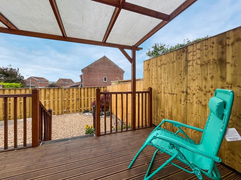 Sitting-out-area | Cayton Cove Cottage, Cayton, near Scarborough