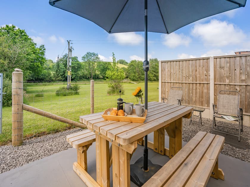 Sitting-out-area | The Old Cowsheds 2 - Shippon - Gaer Cottages, Cribyn, Lampeter