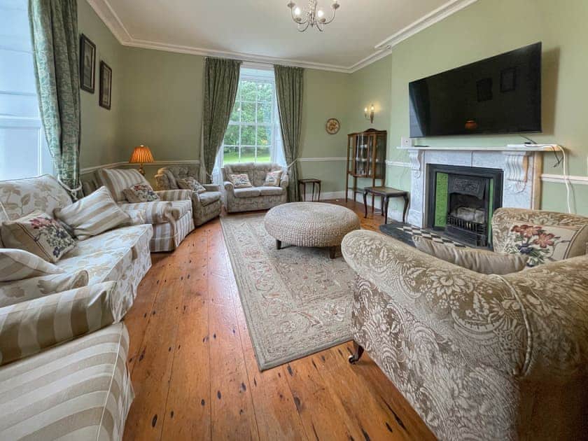 The Sitting Room is bright and airy with comfortable seating and a large smart TV. Ideal for large groups and families to get together | Hafod Grove - Hafod Grove and Fach, Moylegrove, near Ceibwr Bay