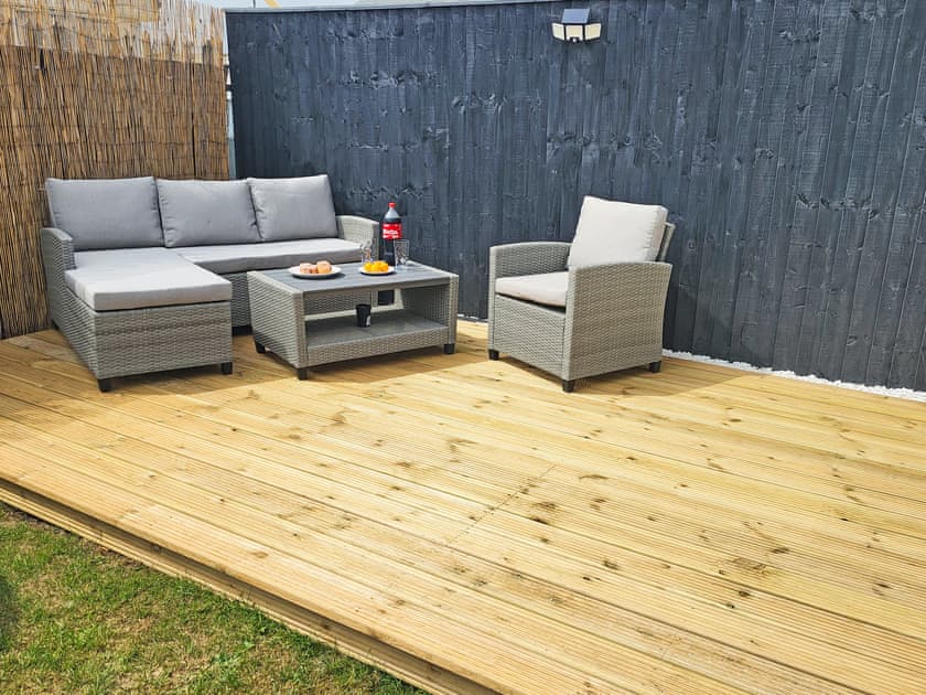 Outdoor area | Chalet 61, Chapel St. Leonards