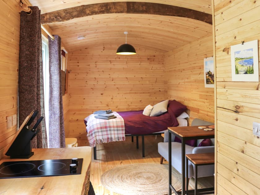 Open plan living space | Shepherds Hut Two - Island Hut Retreats, Rhosmeirch, near Benllech
