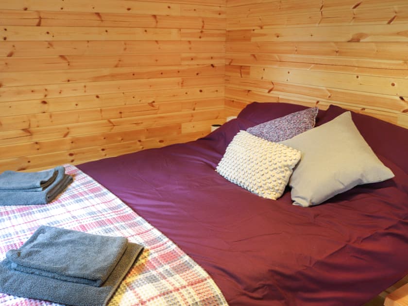 Double bedroom | Shepherds Hut Two - Island Hut Retreats, Rhosmeirch, near Benllech
