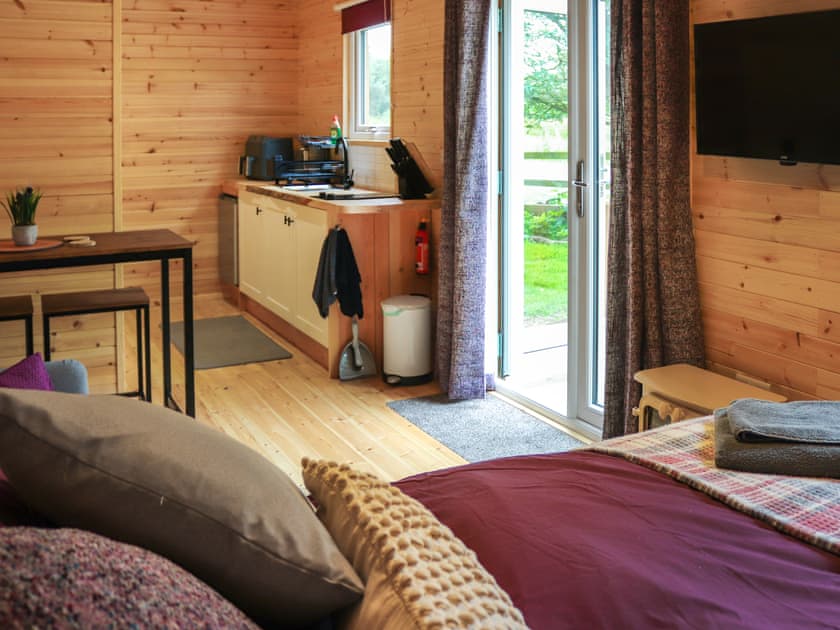 Open plan living space | Shepherds Hut Two - Island Hut Retreats, Rhosmeirch, near Benllech