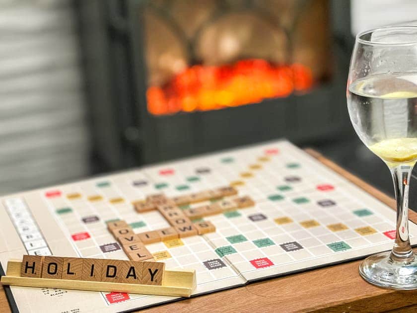 Plenty of games, books and videos for relaxing by the fire | Puffin Burrow, Portmellon, near Mevagissey