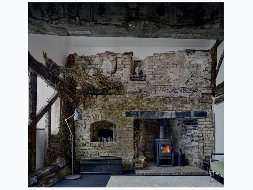 The snug, showing dead ivy, a bread oven and fire place  | Croft Lodge Studio, Leominster